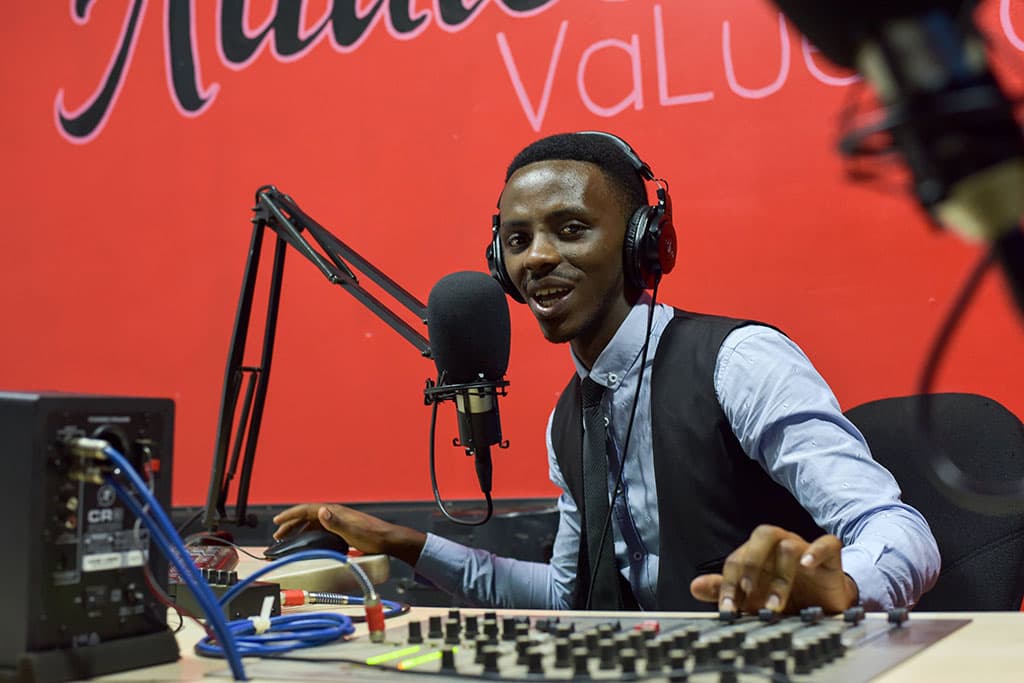 Christian talking on the radio