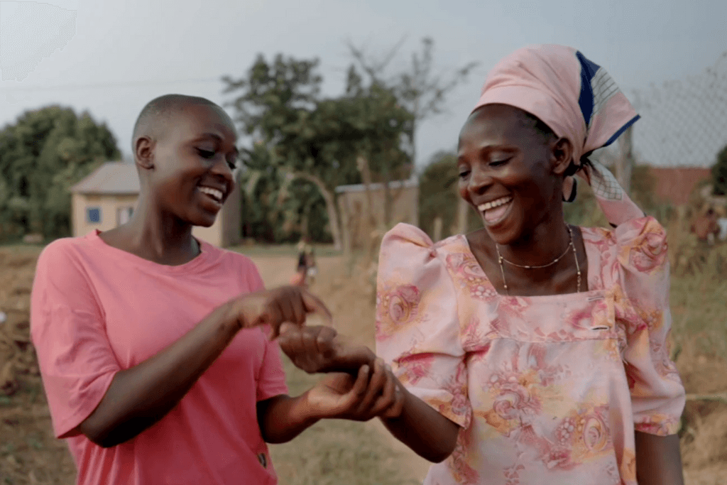 Monica and Devine laugh together