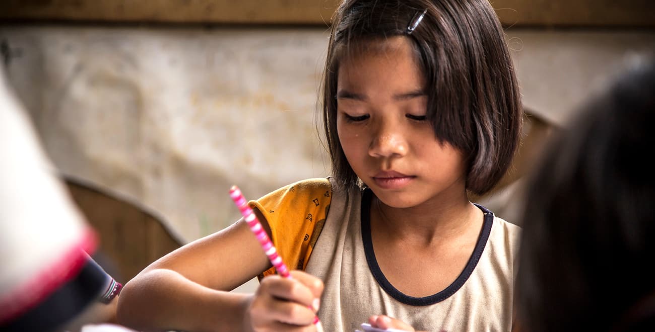 Lalita studying at school