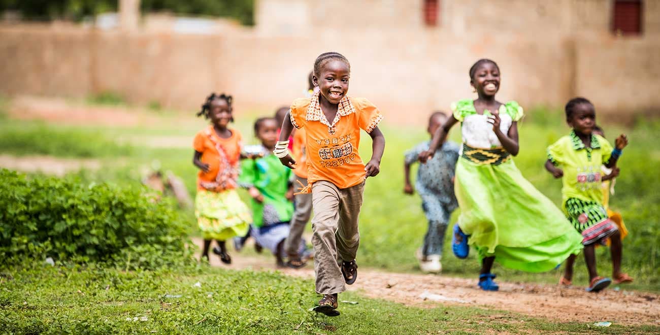 Children running in Burkina Faso