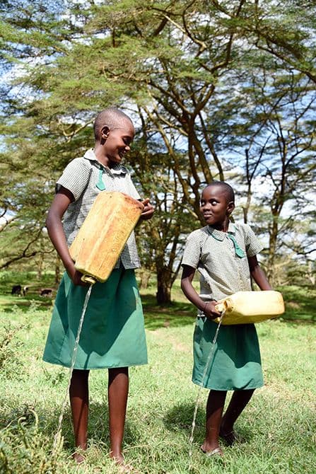 sisters collecting water