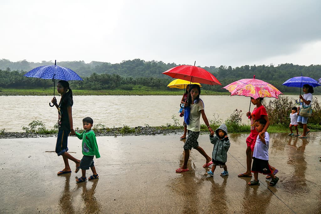 parents with children in the Philippines