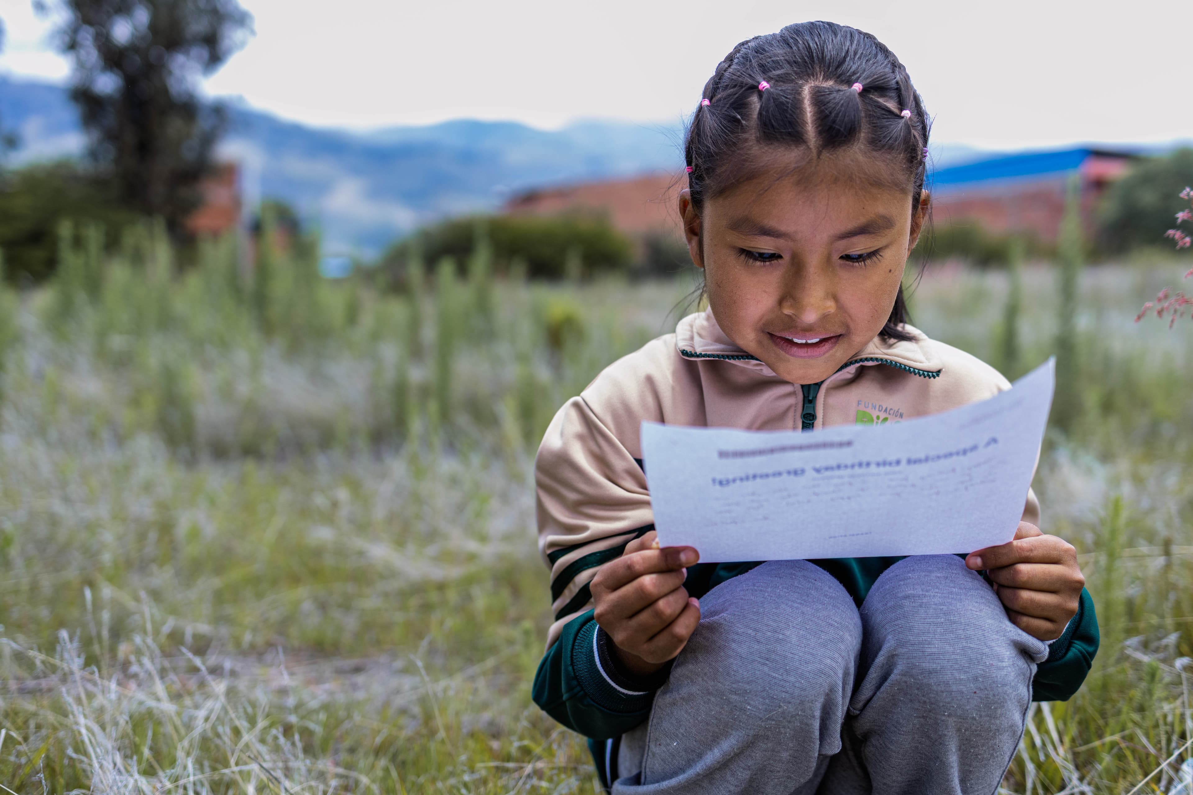Emily reading her letter