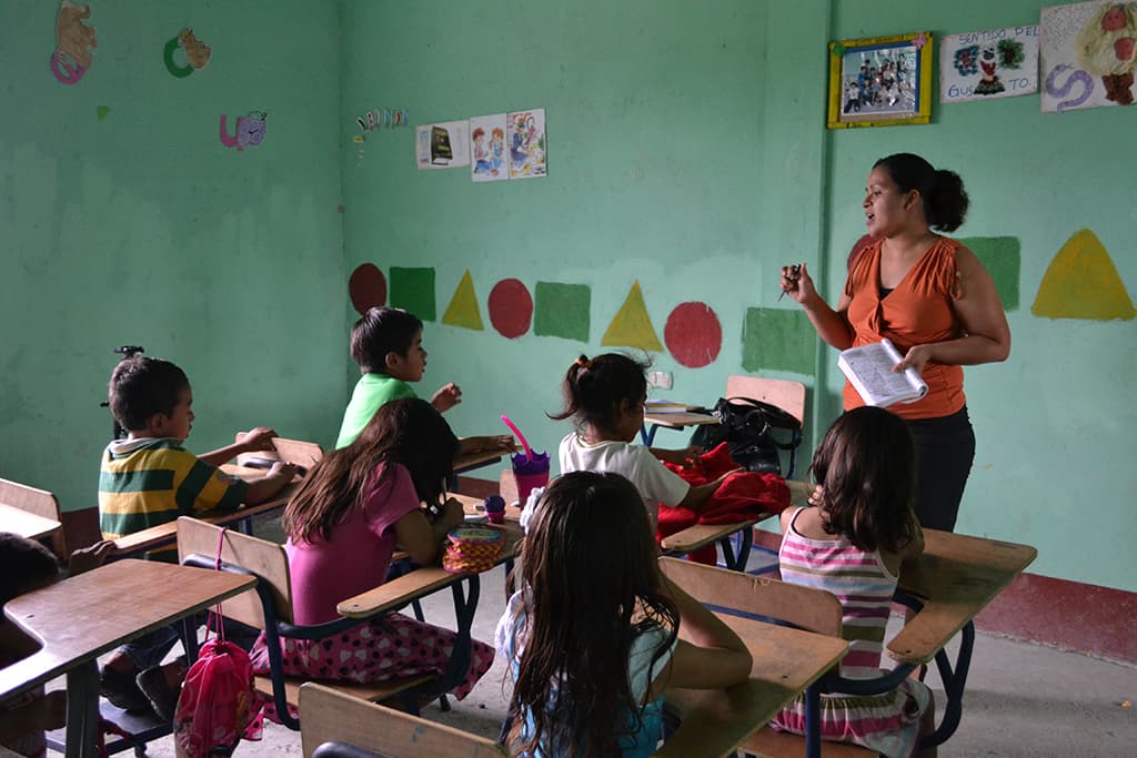 school teacher in classroom