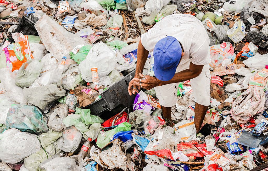 Searching for plastic or metal to sell