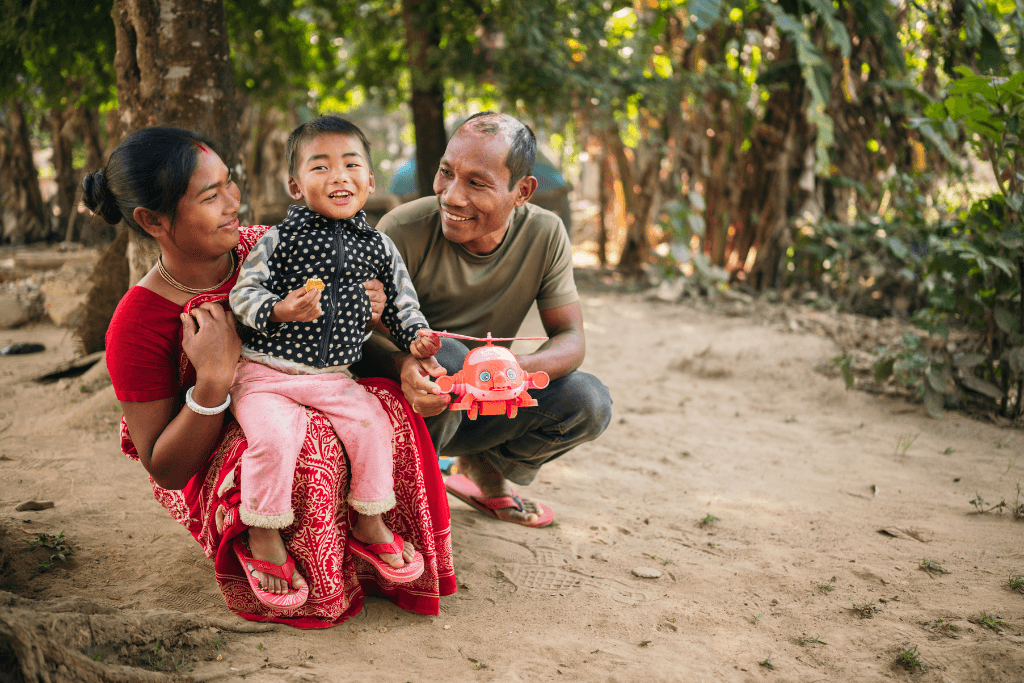 Kohima and baby Joy sitting