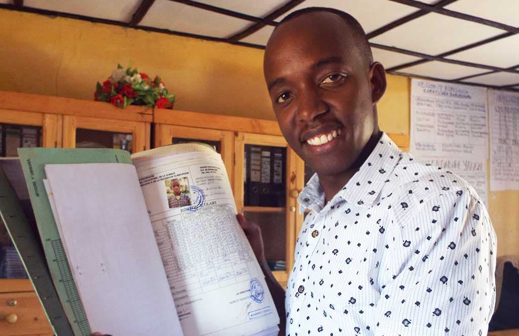 Emmanuel with his old child folder