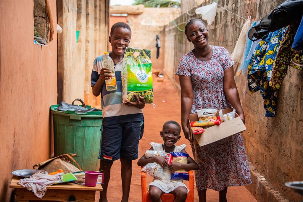 A family's joy at receiving a food parcel