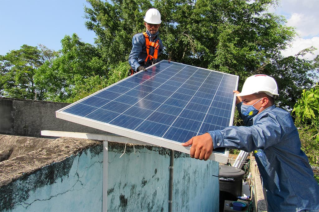 A solar panel being installed in Colombia