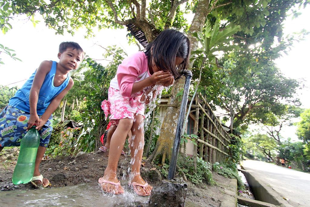 drinking from water tap