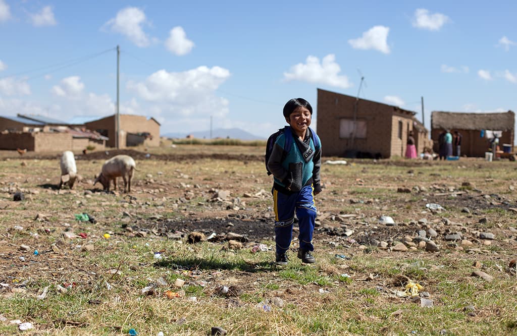 Tumuyo setting off on his journey to school.