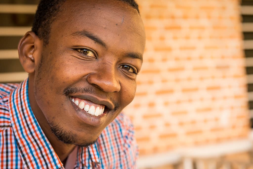 Genocide Survivor Methode smiling
