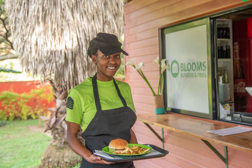 Philomene waitresses at a fast-food restaurant