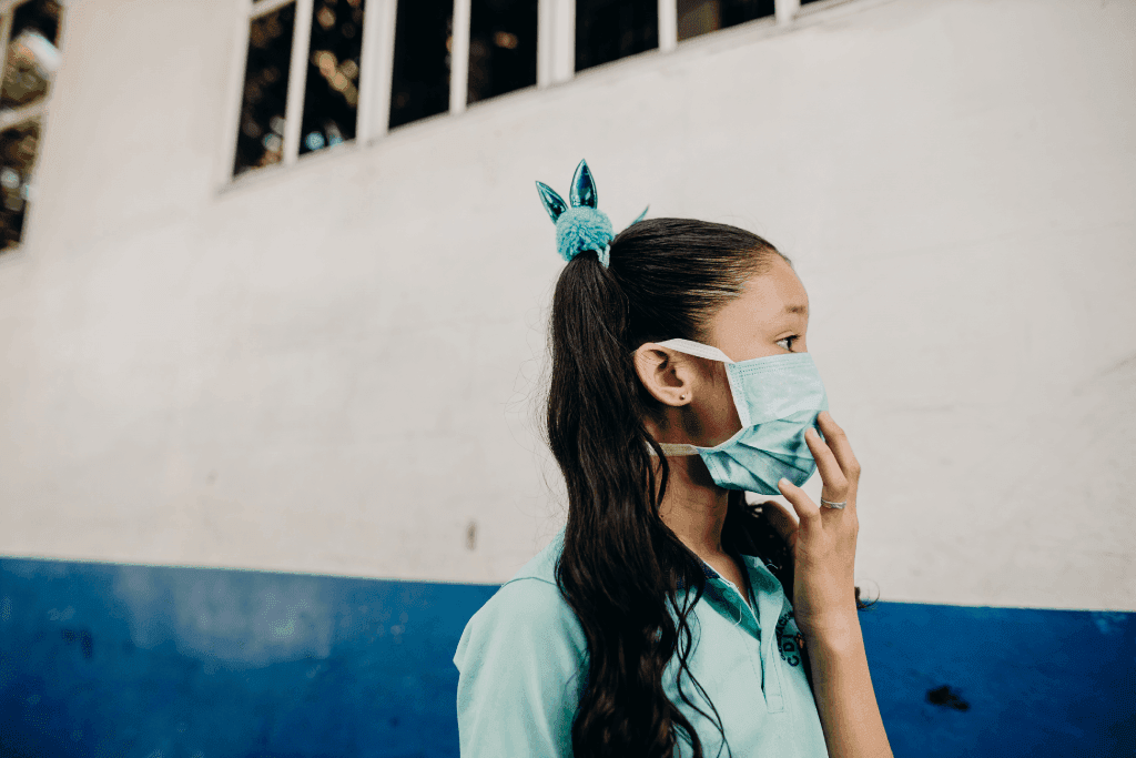 girl wearing face mask