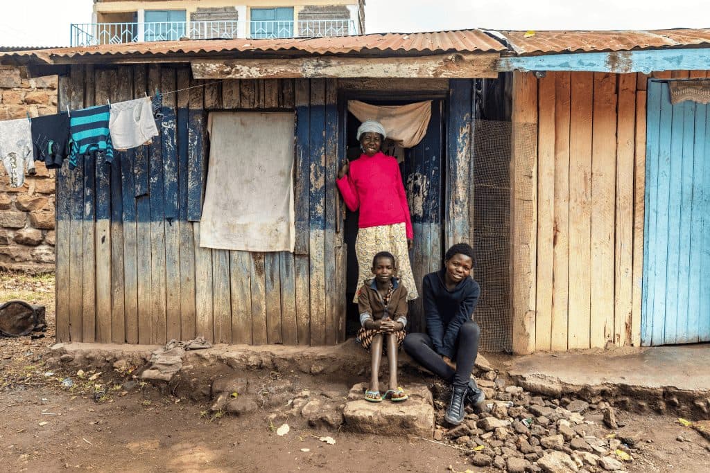 family outside house