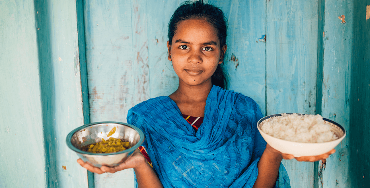 Bobita holds rice