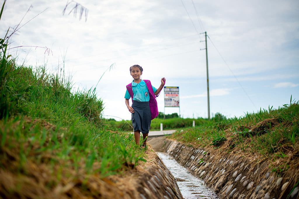 Taywa walking to school