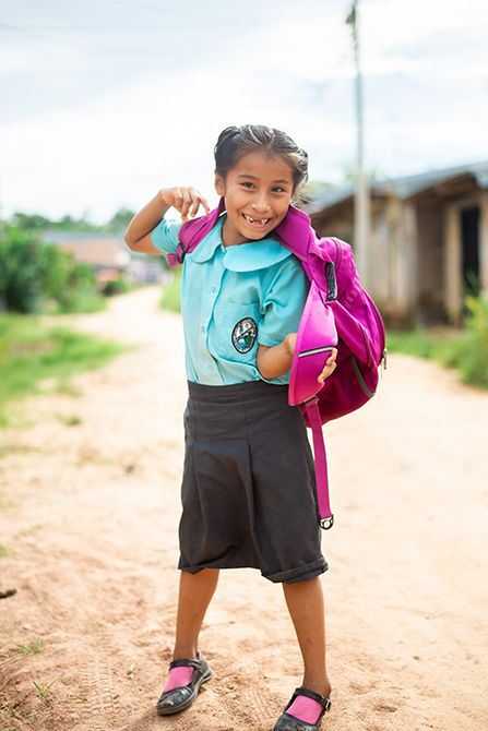 Taywa wearing her pink school bag.