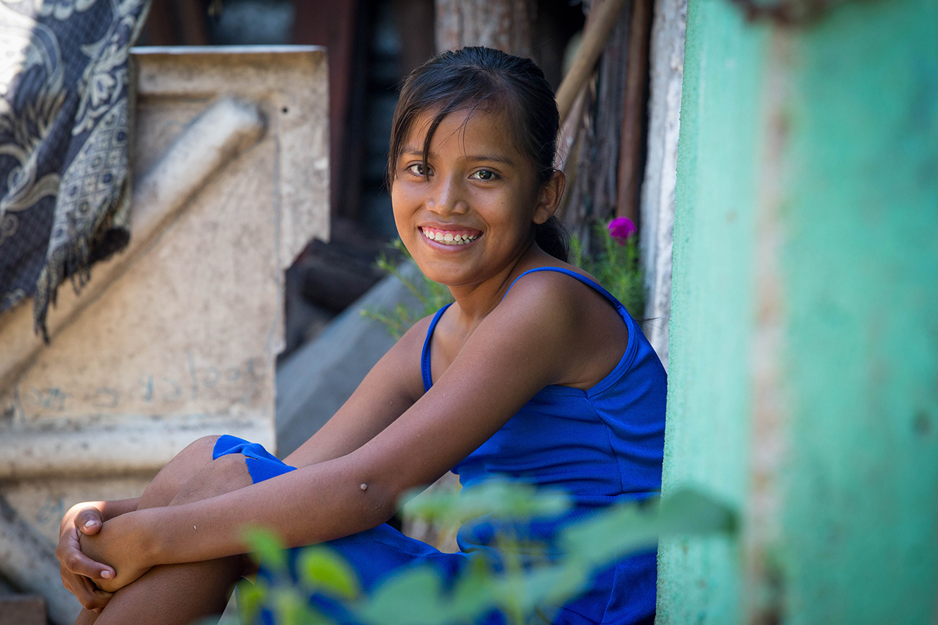 Girl in Mexico smiling with dignity