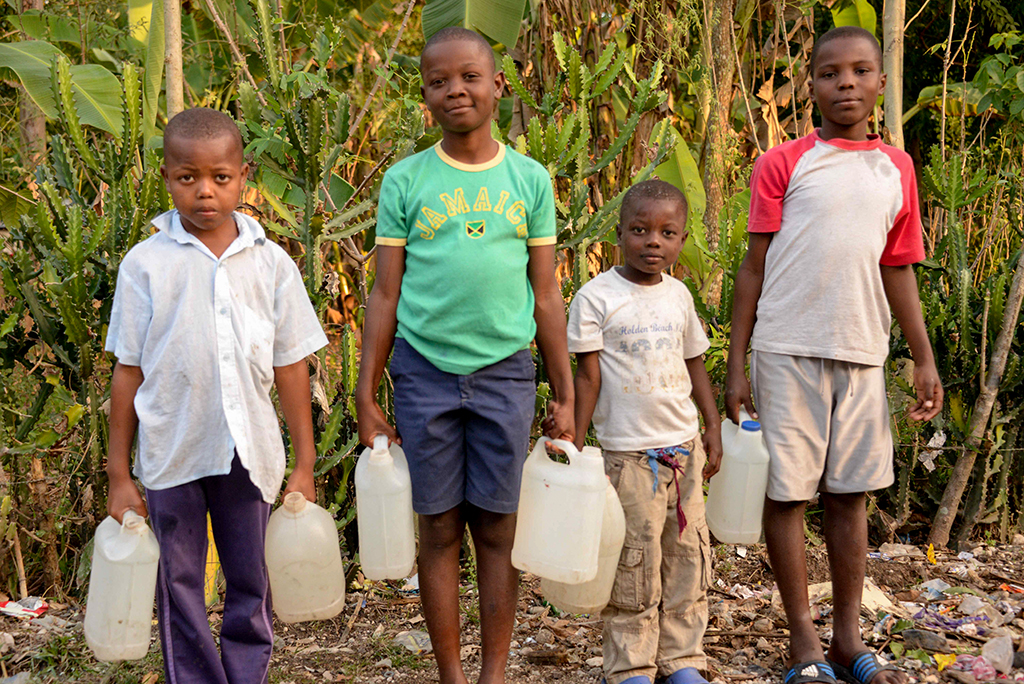 fetching water in Haiti