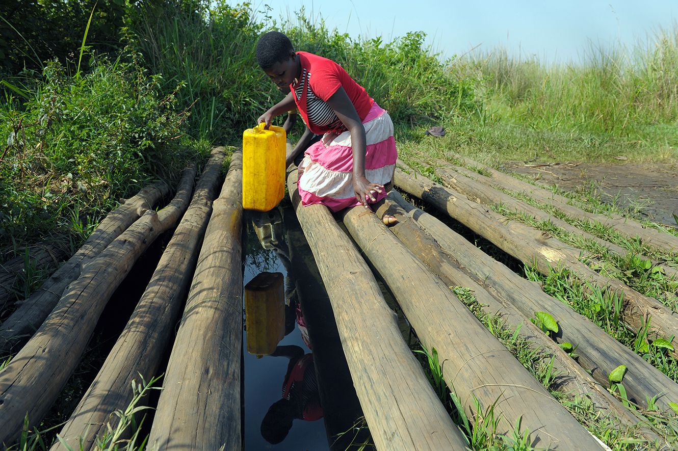 collecting water in uganda