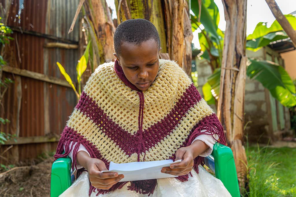 Esther from Tanzania reading