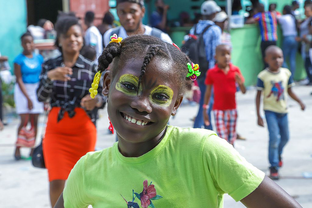 girl enjoying fun fair Haiti
