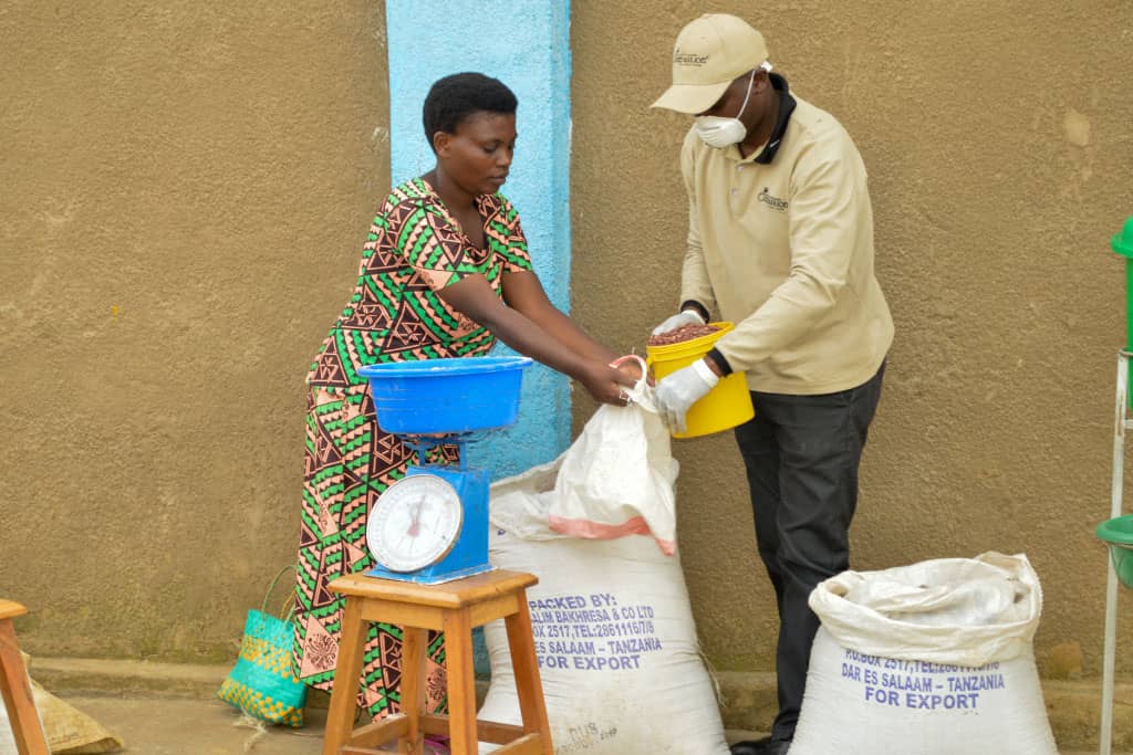 A lady receives food supplies thanks to Gift Aid