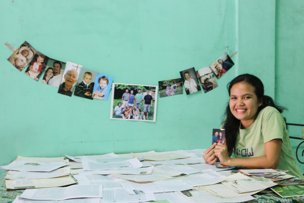 Ani surrounded by letters and photographs