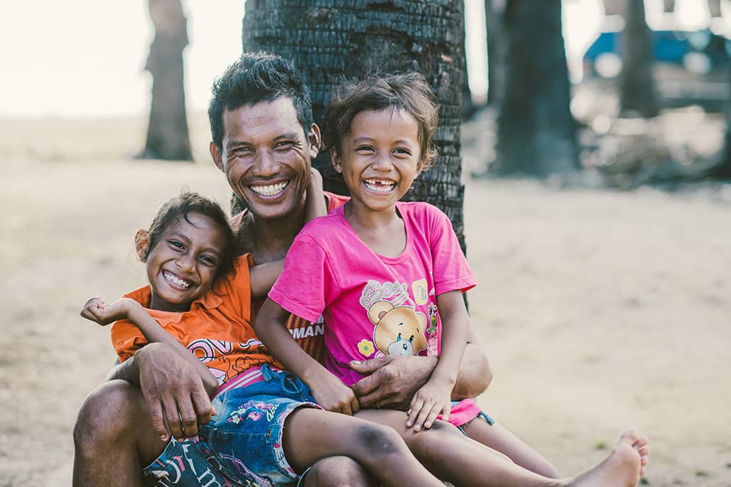 A smiling family in Indonesia