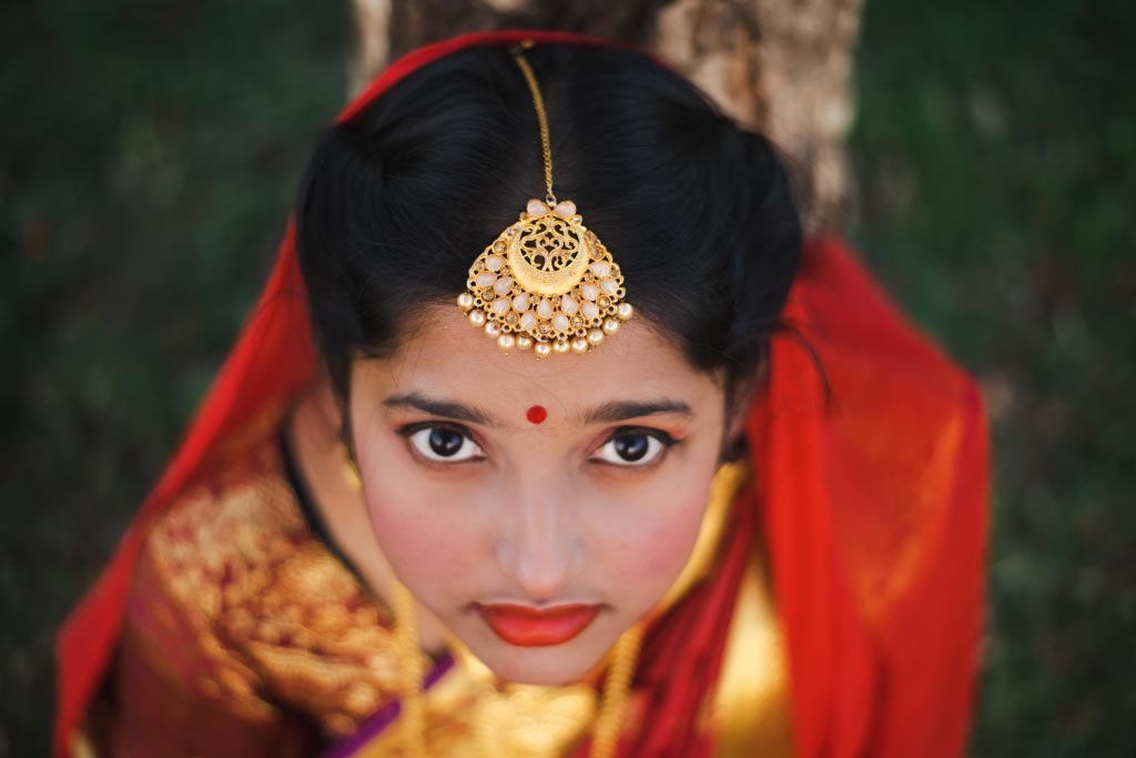 14-year-old Tisha in Bangladesh may be dressed in fine bridal wear, but she is wearing it to stand against child marriage.