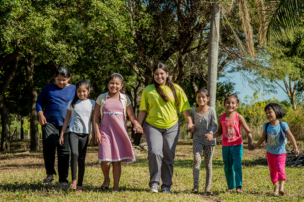 Annet with a group of girls from her community in Bolivia